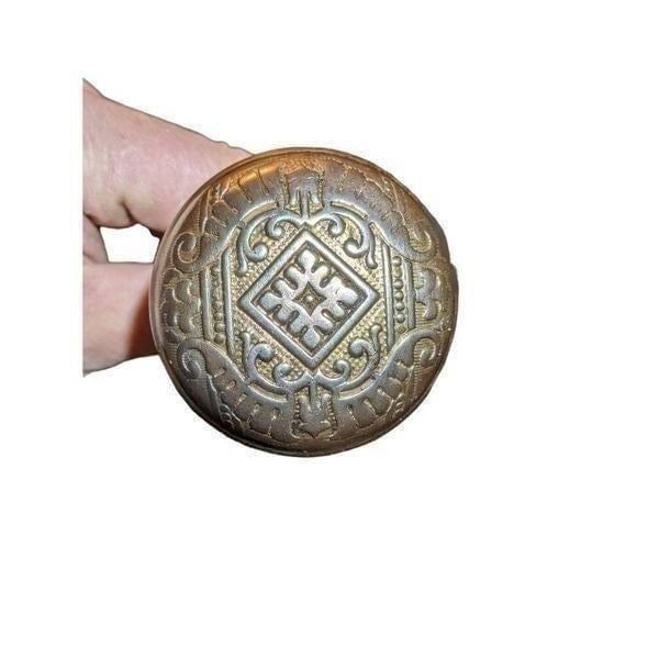 Antique metal door knob with stem