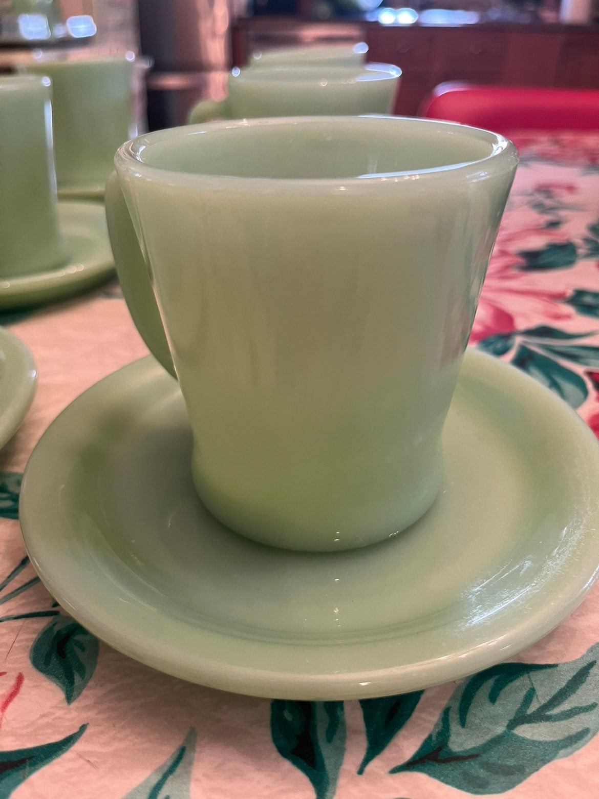 4 Fire King jadite D handle mugs and RW saucers.
