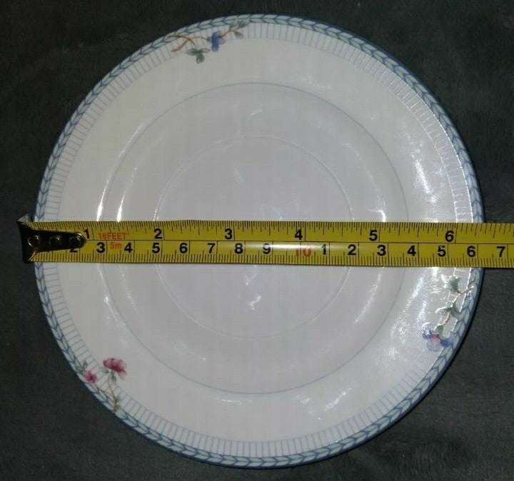 Set of 4 Oneida Fine Porcelain Blue Lattice Saucers