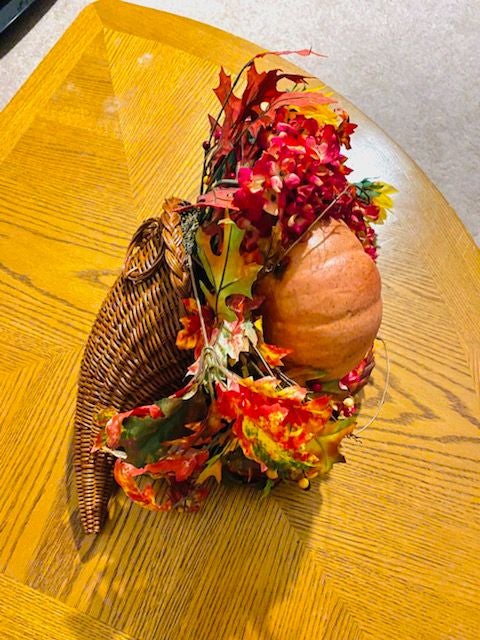 Cornucopia basket for decorative purposes