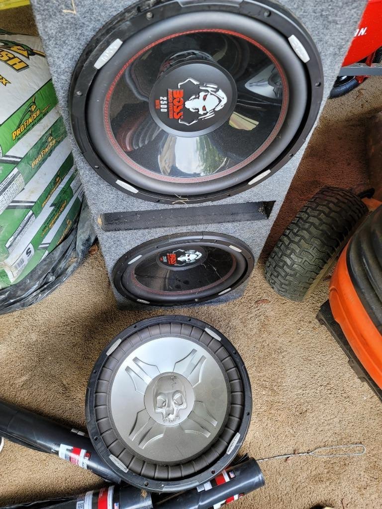 Two 15in Boss subwoofers box and amp included