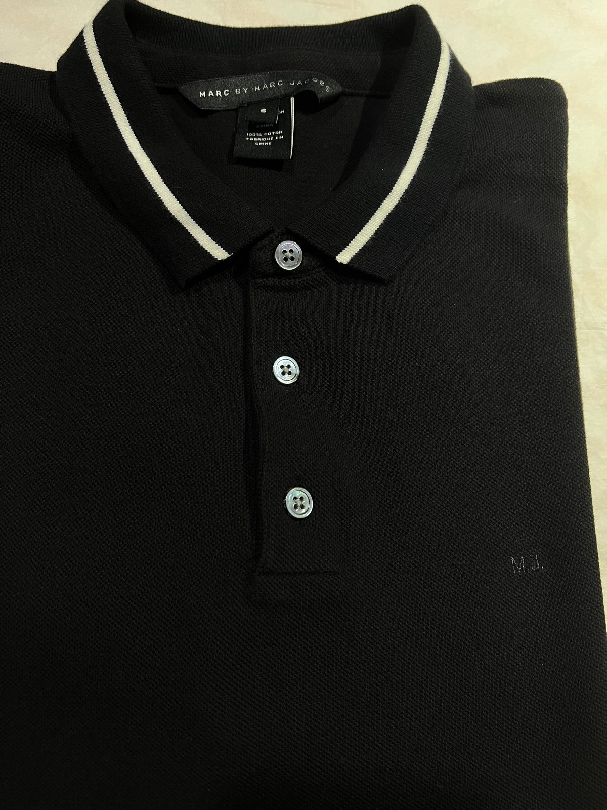 Questions? Leave a comment below! Marc by Marc Jacobs Black polo shirt Size: