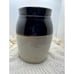 Brown and white stoneware crock