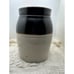 Brown and white stoneware crock
