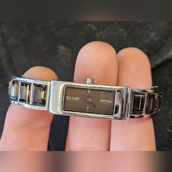 WOMENS DKNY WITHBROWN TOPAZ STONES IN THE STRAP