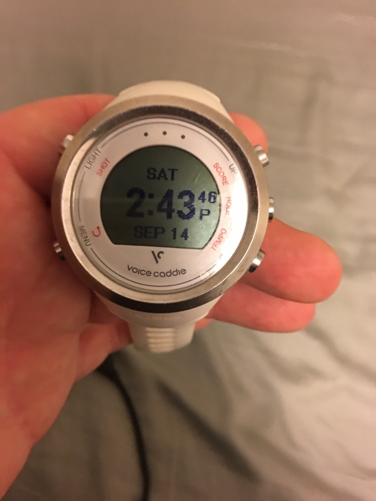 Voice Caddie GPS golf watch with charger