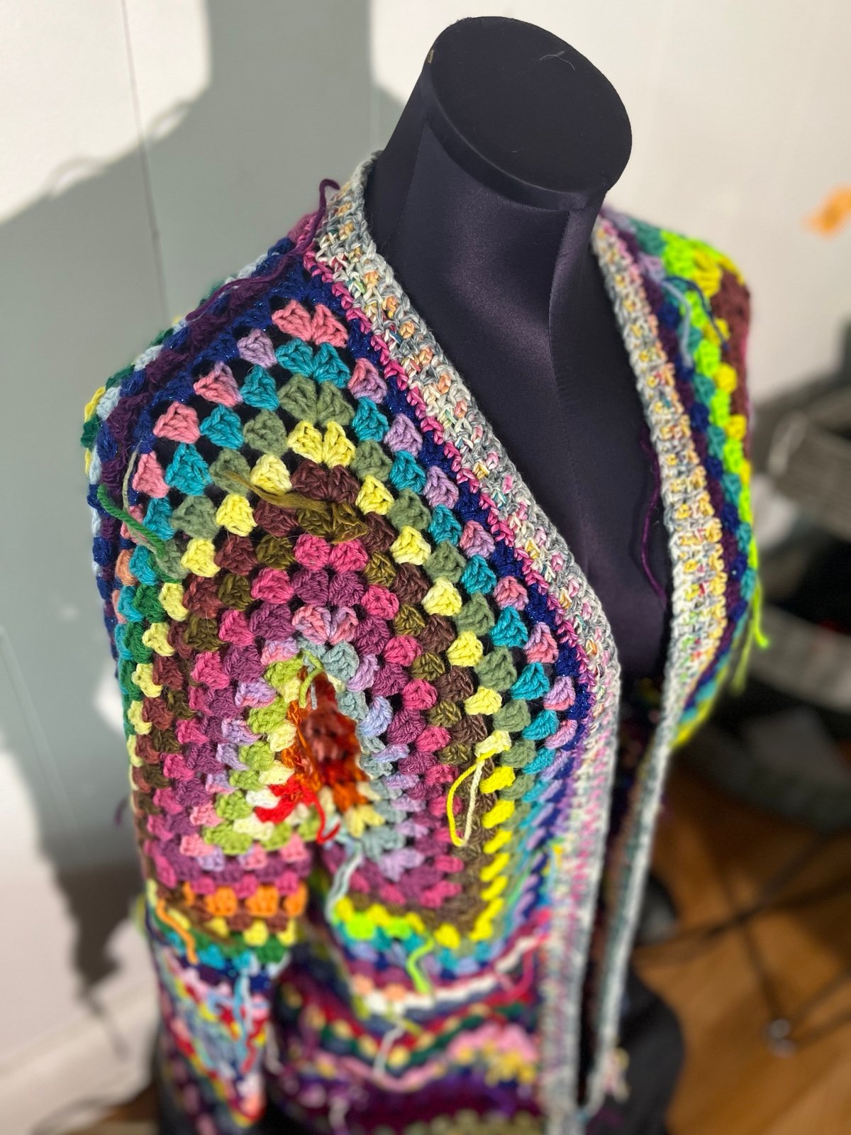 Crocheted scrap yarn cardigan size large