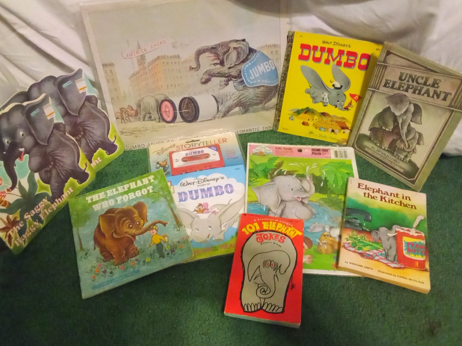 Lot of ten (10) vintage elephant books, puzzle, and sign.