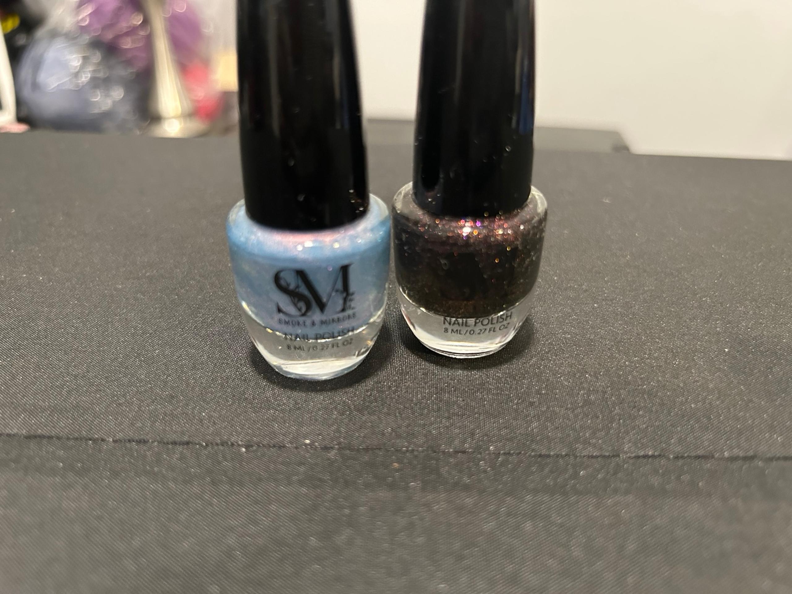 smoke & Mirrors sparkle blue  and dark purple Nail polish
