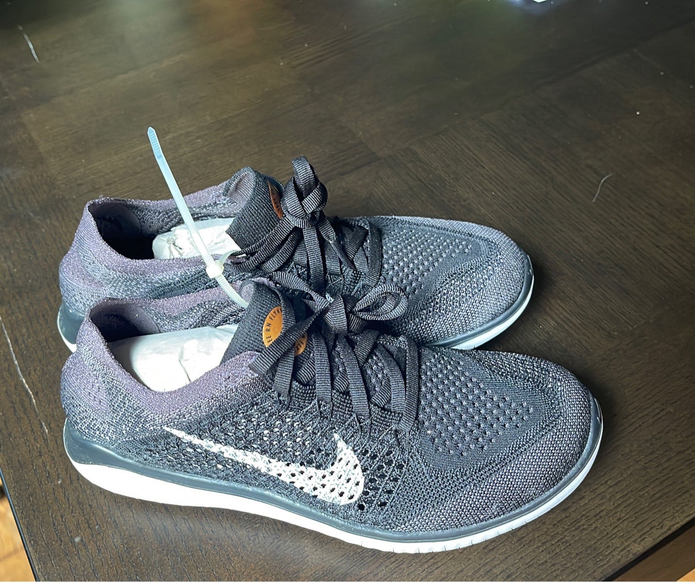 Nike Women's Free RN Flyknit 2018 Condition: New Color: Black/Grey