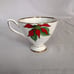 Vintage Taylor & Kent Bone China Poinsettia Teacup and Saucer.