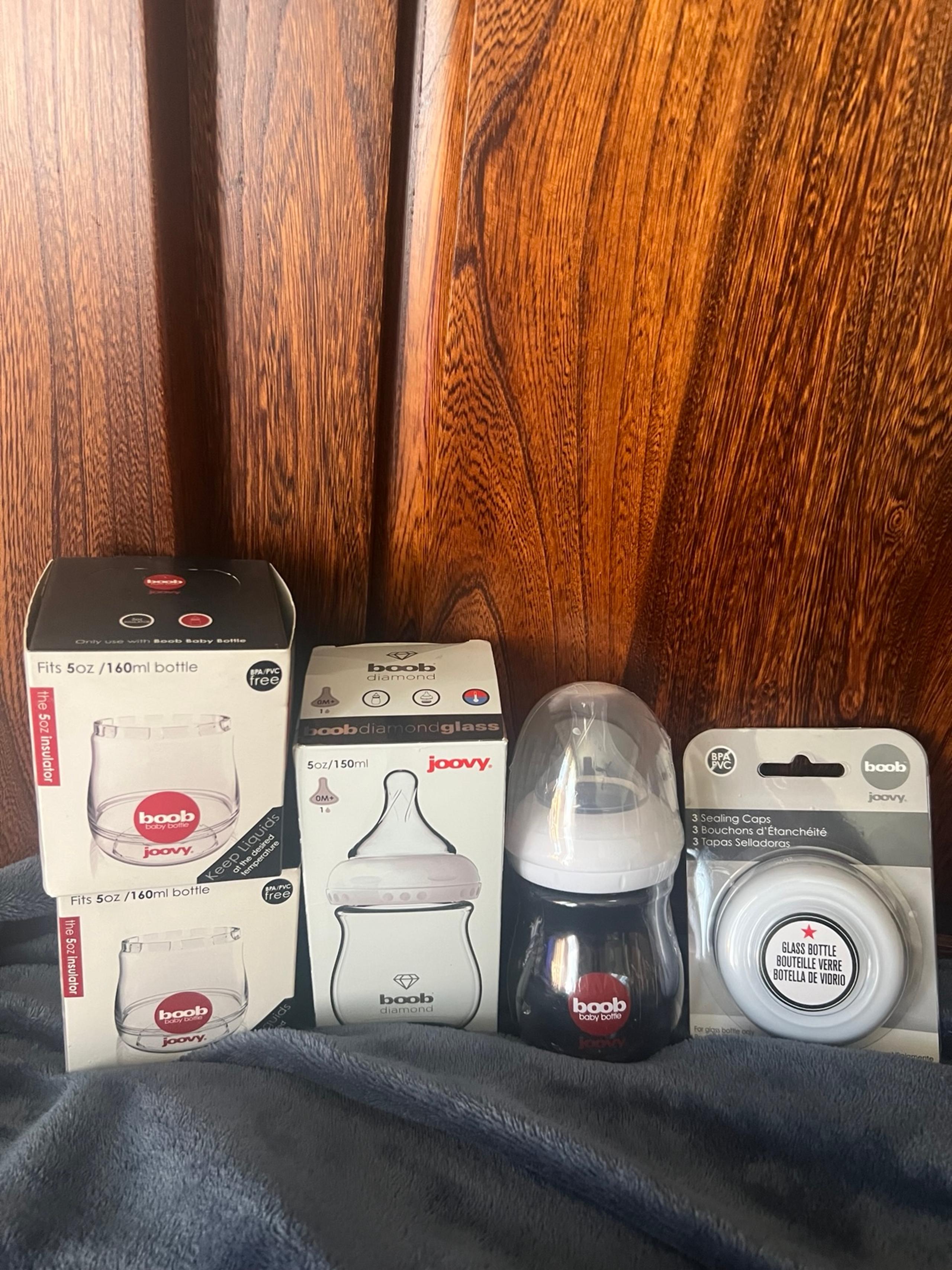 Joovy 5 Piece Bundle, 2 bottles, 2 insulators & package of 3 sealing caps, new