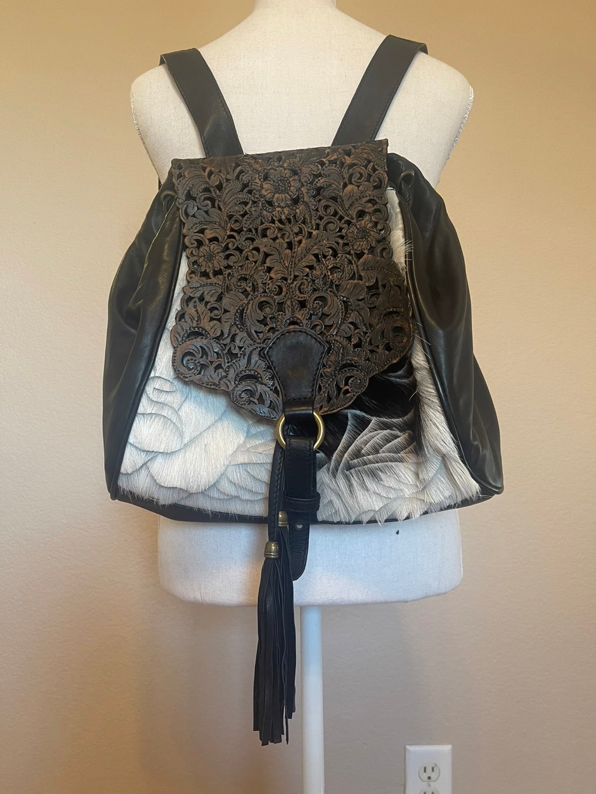 Handcrafted genuine leather backpack.