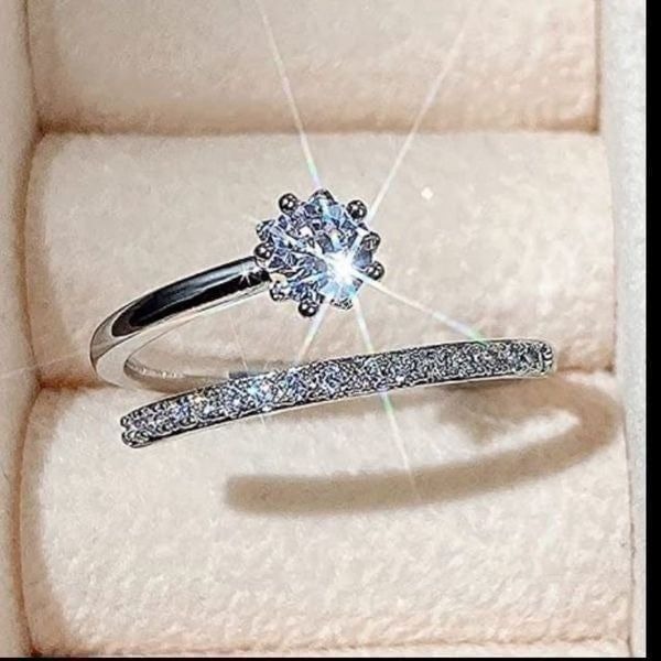The Shooting Star Bypass Ring adjustable with cubic zirconia and 925 silver