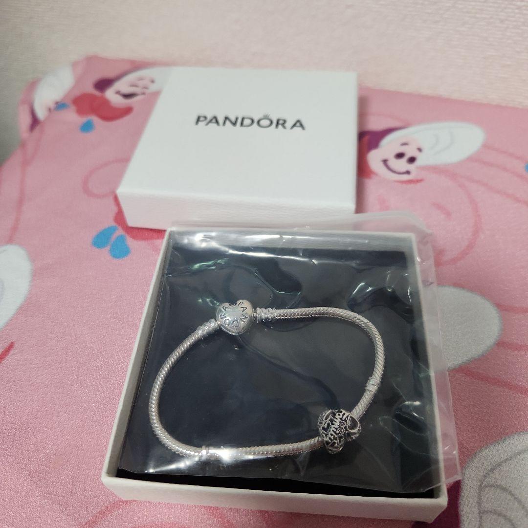 Pandora silver bracelet with heart-shaped charm