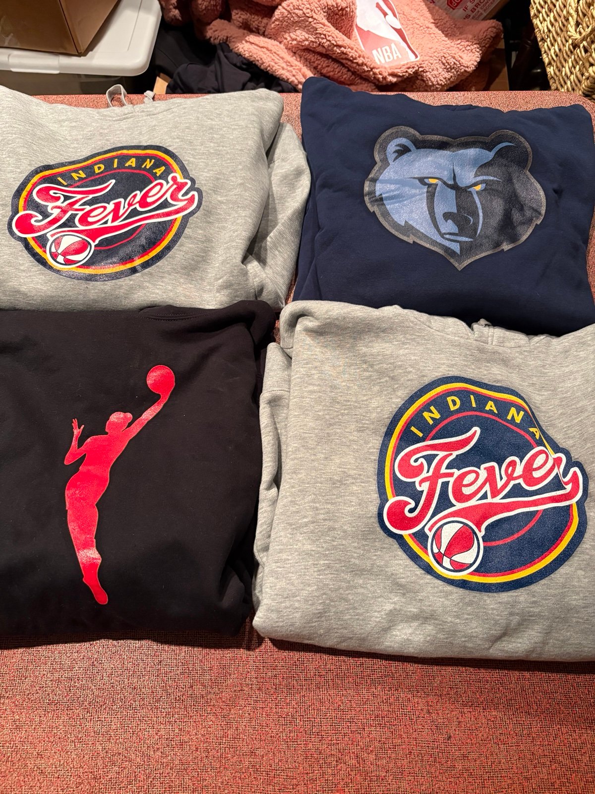 4 large WNBA and NBA hoodies