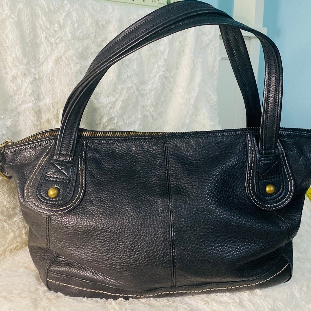 The Saks pebble leather shoulder bag in Black with gold hardware