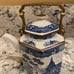 Teapot white and blue with brass handle
