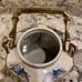 Teapot white and blue with brass handle
