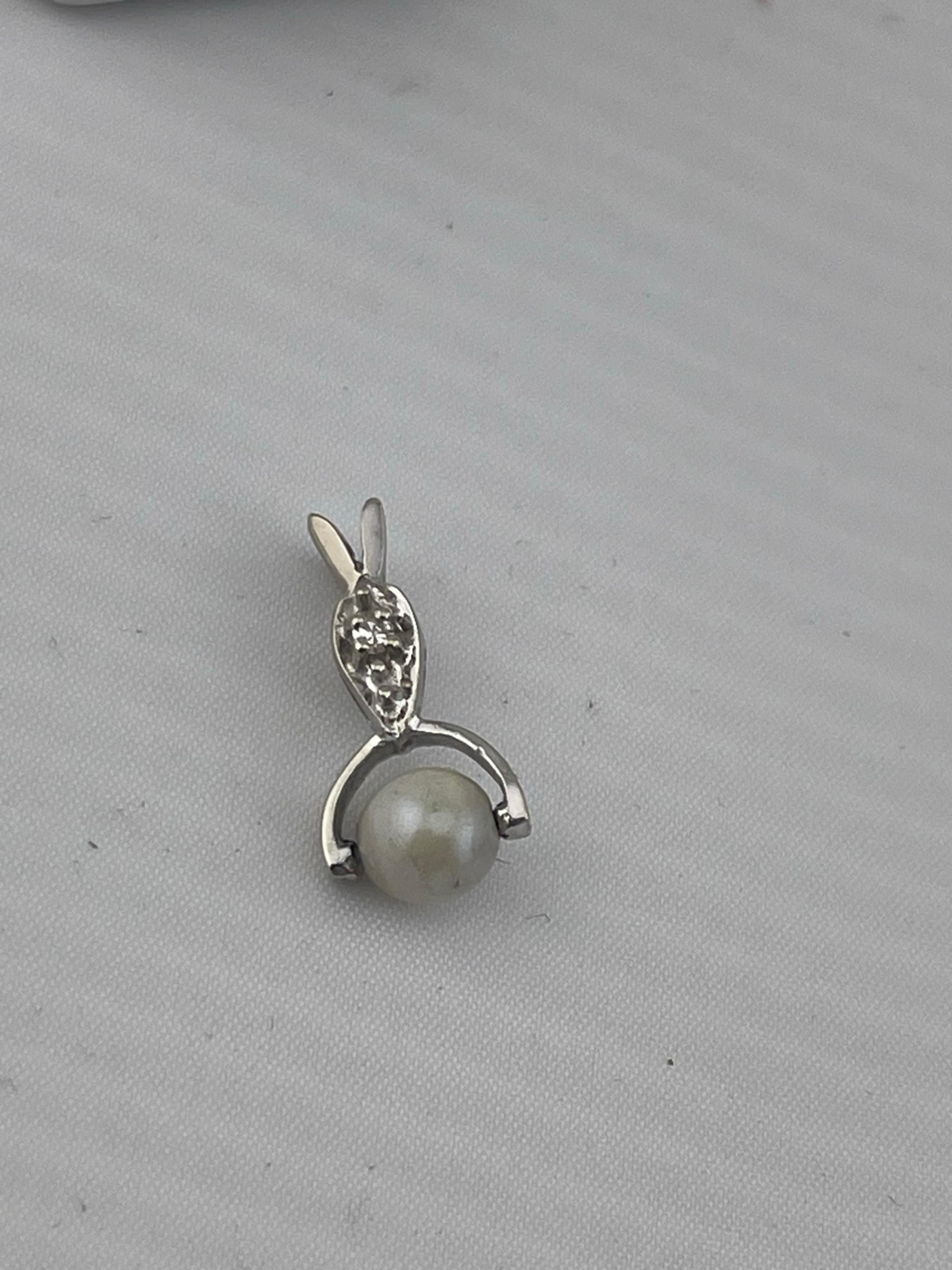 Antique 1/10CT mine cut diamond and pearl spin pendant 14 carat white gold
