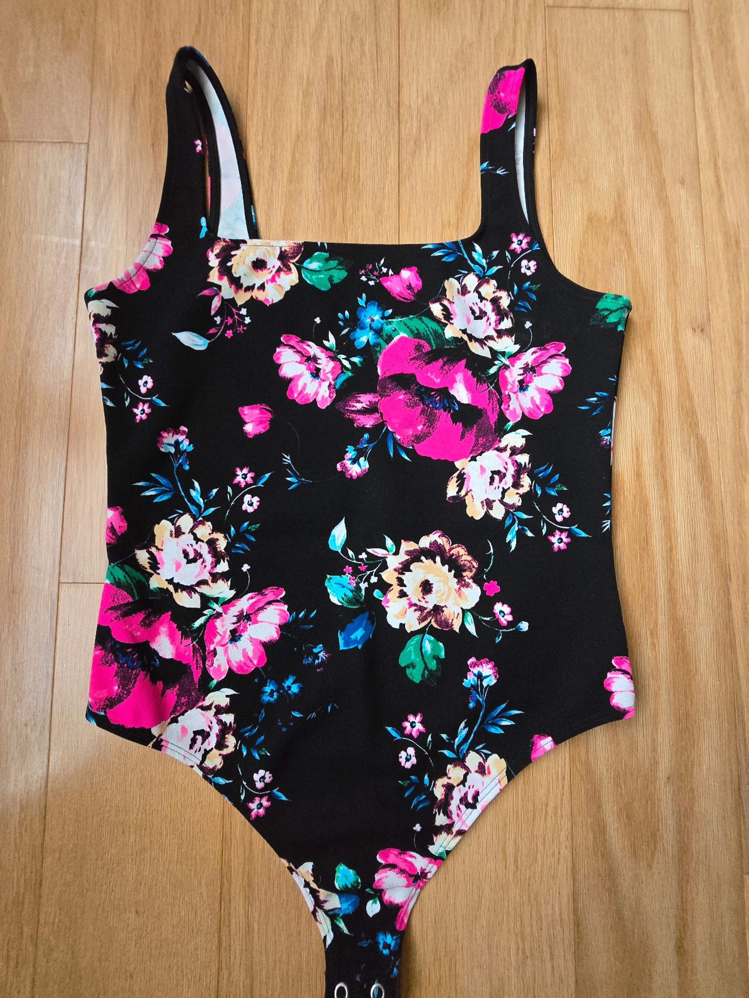 Express women's floral bodysuit size M medium