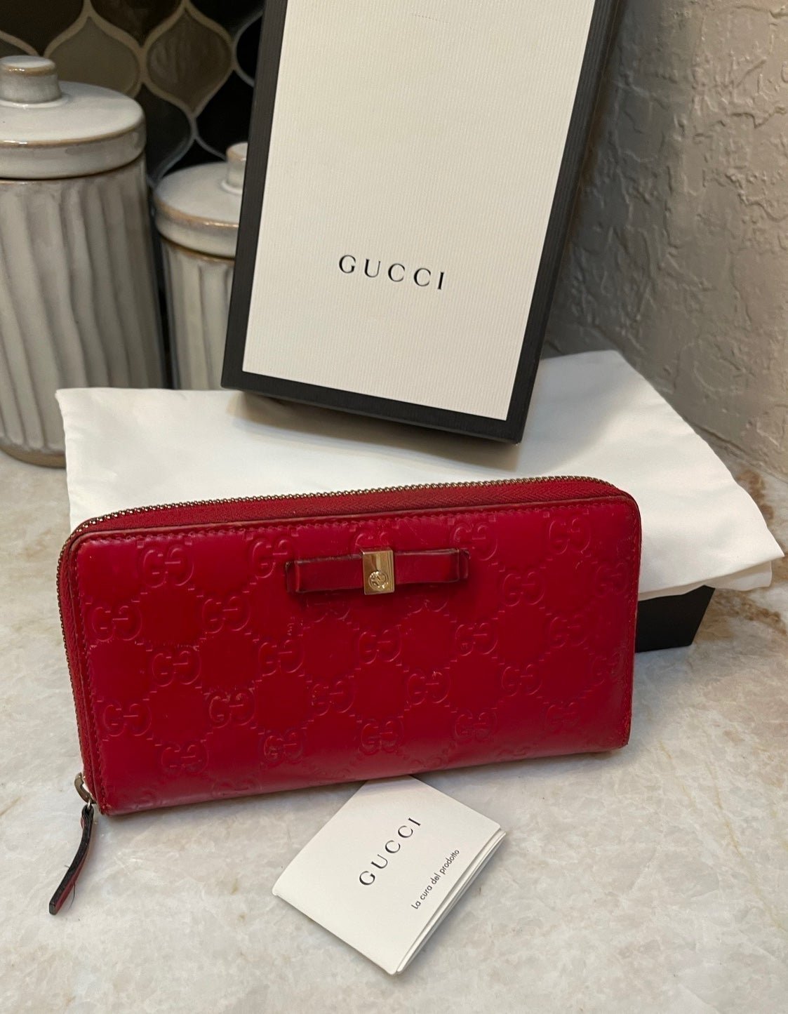 Gucci red leather logo guccissima ziparound wallet