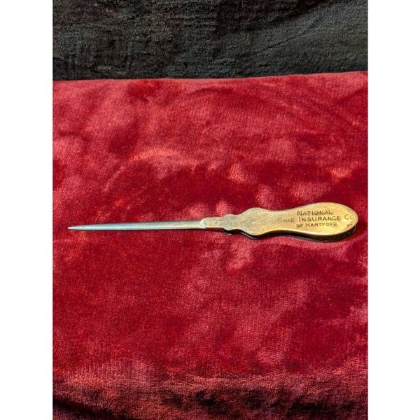 Antique silver plated letter opener w/ check embossing protecter