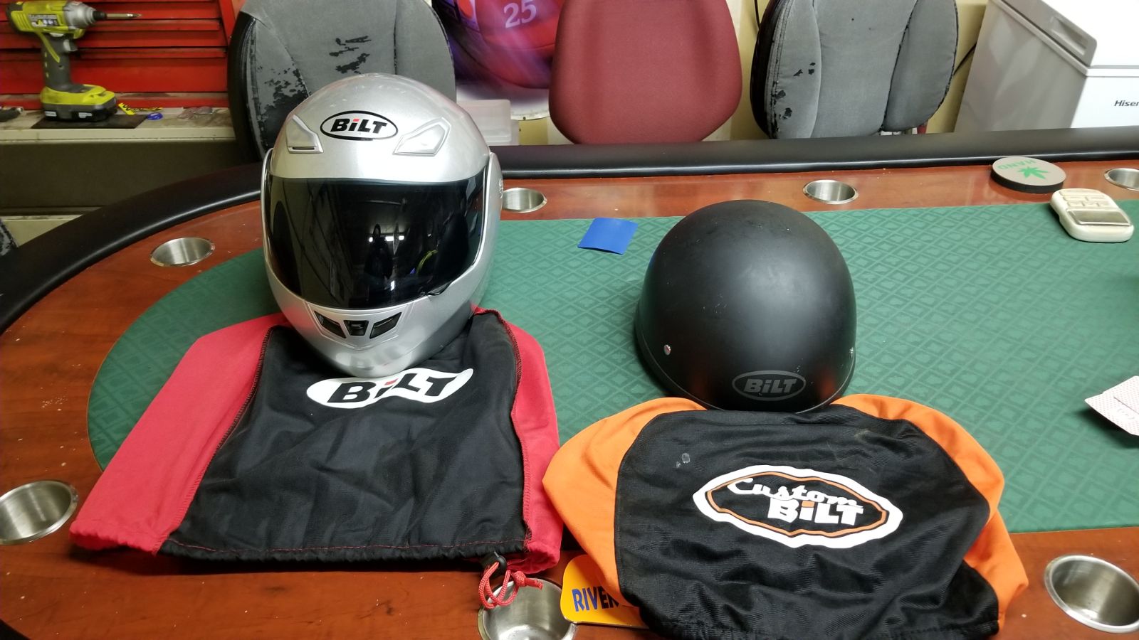 Two helmets, full face and half helmets