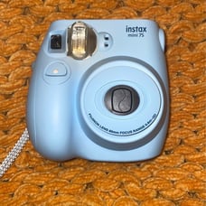 Polariod camera with case and film