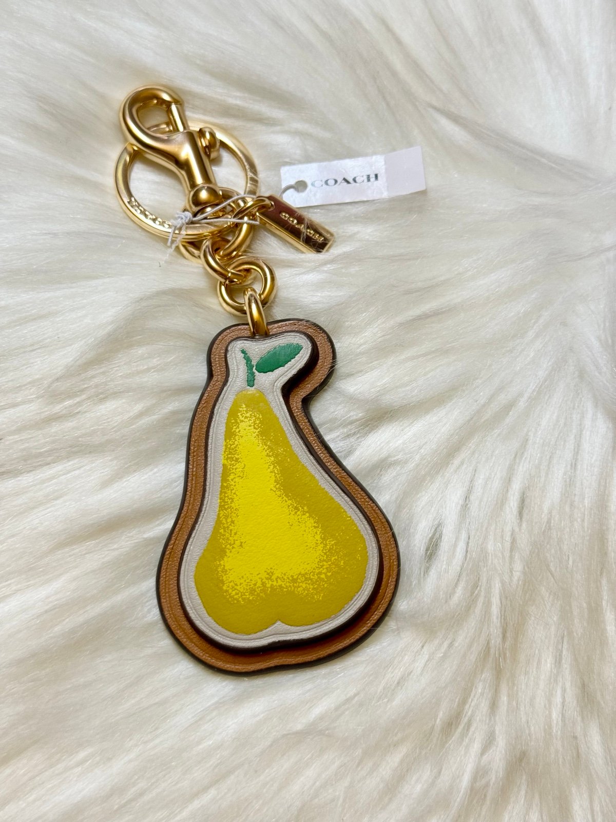 Coach Pear Bag Charm In Signature Canvas