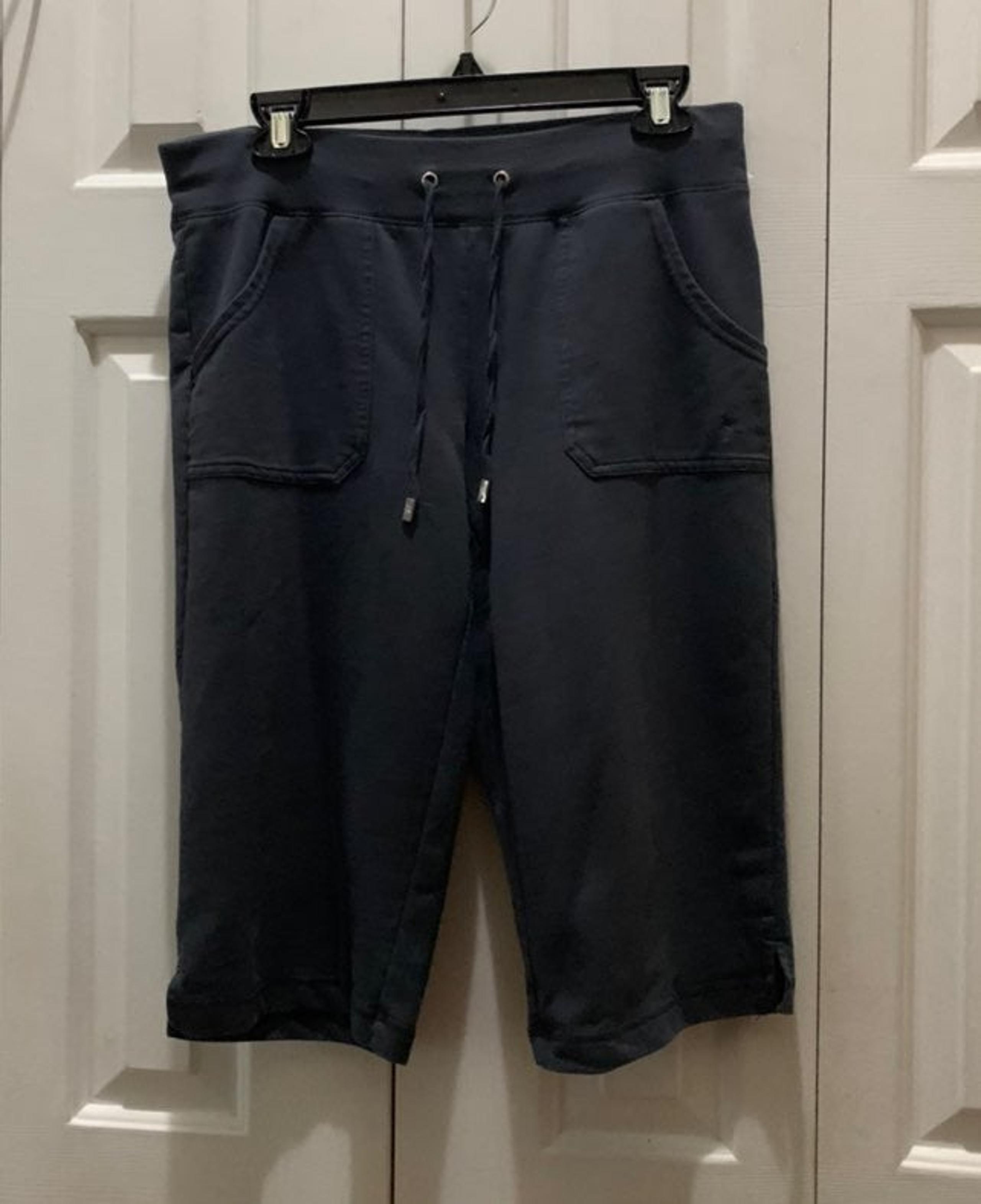 "Danskin Now" Woman Knee High Pants. Color: Navy Blue. Size S