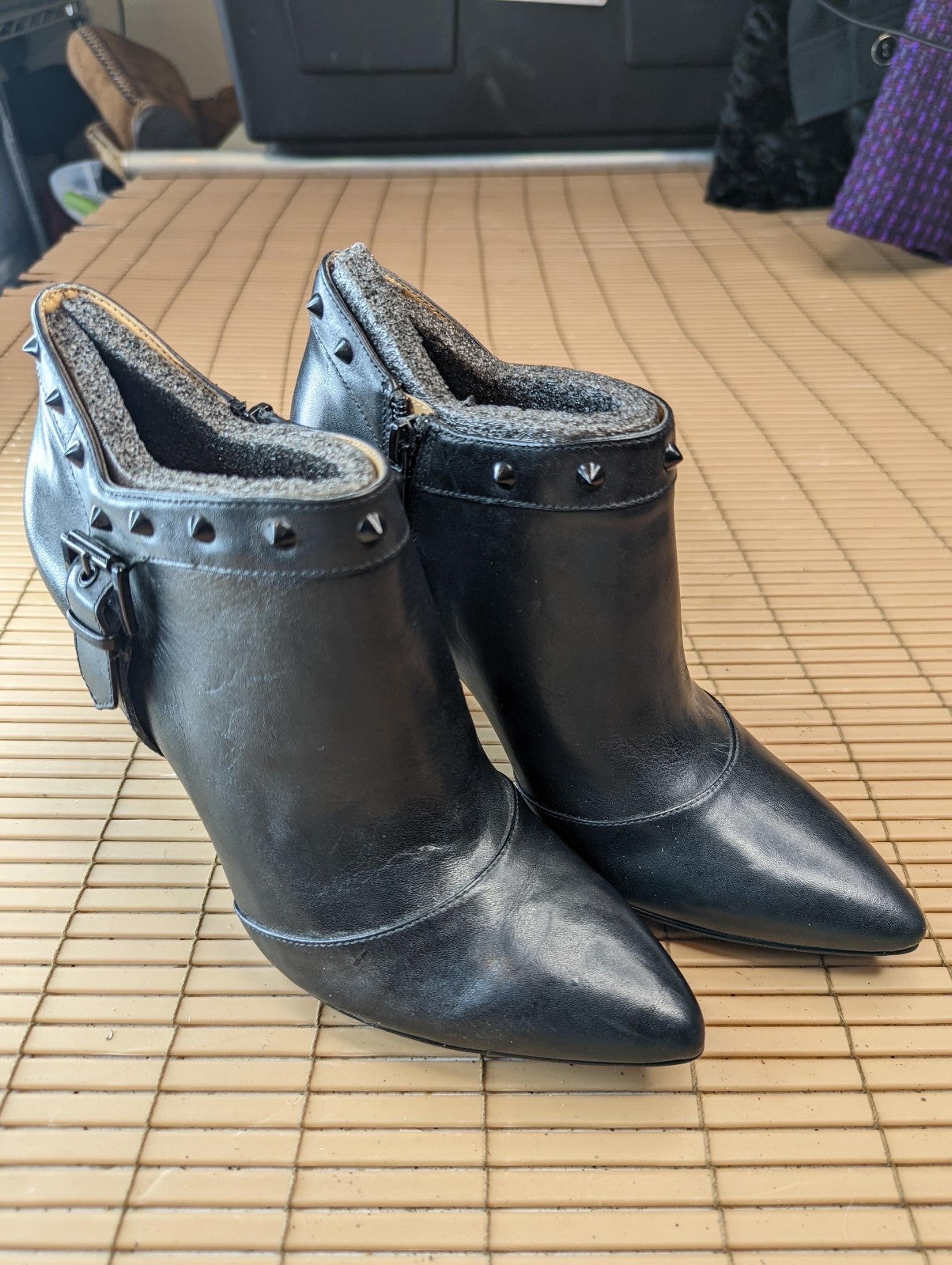 Enzo Angiolini  "EAPresley" black leather side zip Ankle Boots. Studded collar.