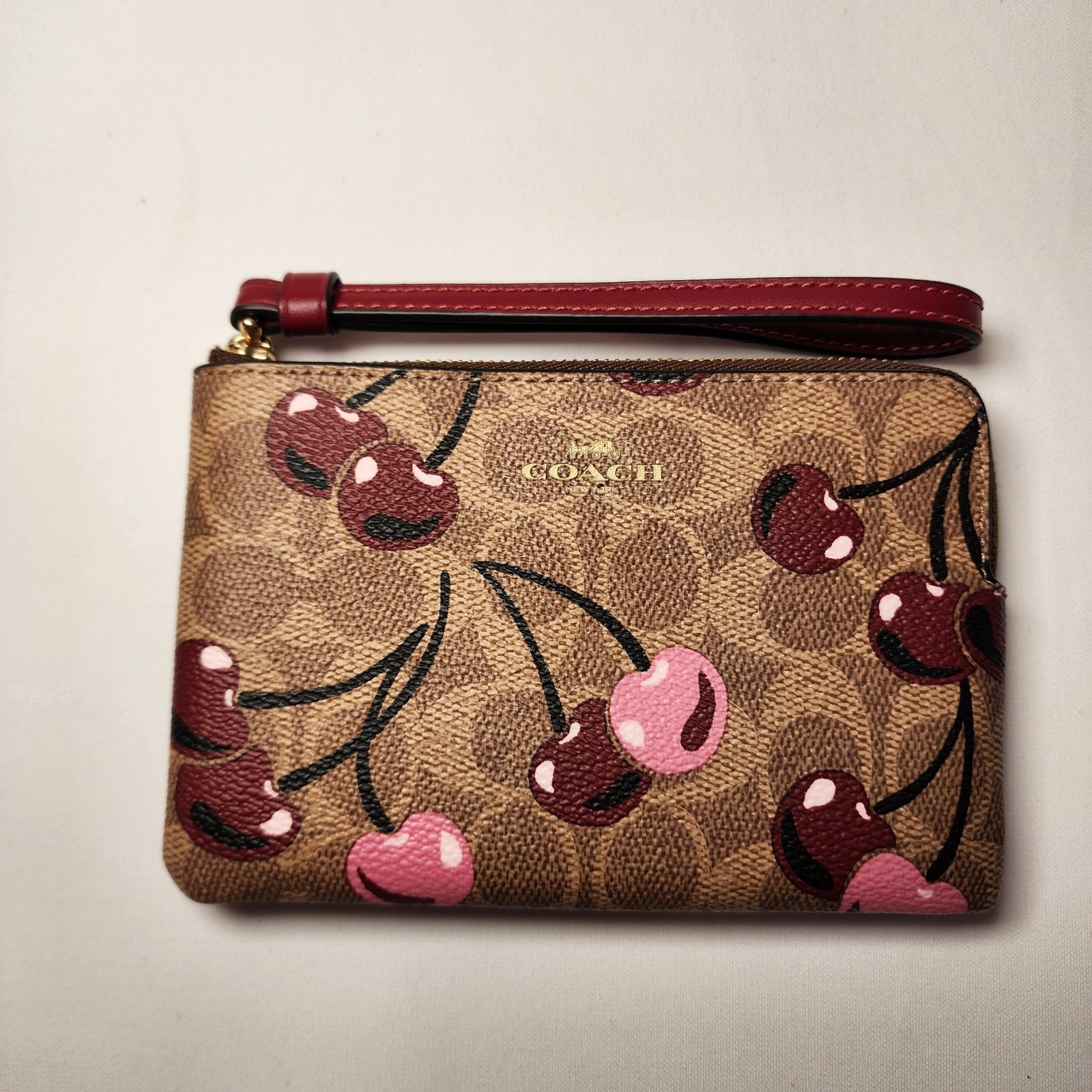 NWT Coach CZ450 Corner Zip Wristlet Signature Canvas Cherry Print Tan Multi v1
