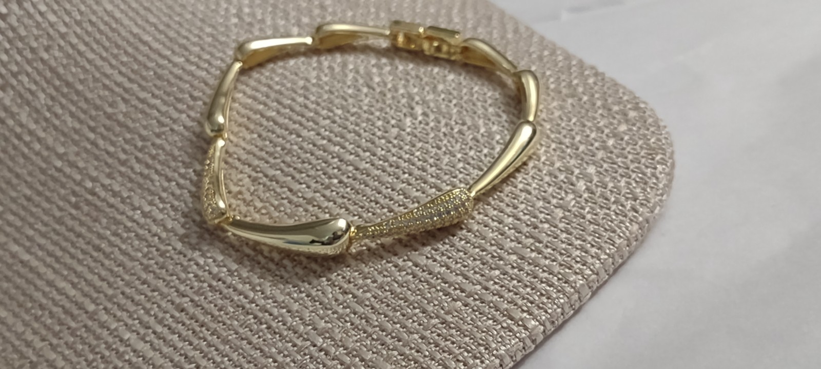 Gorgeous labcultured Diamond pave water drop lit 18K yellow gold over stainless
