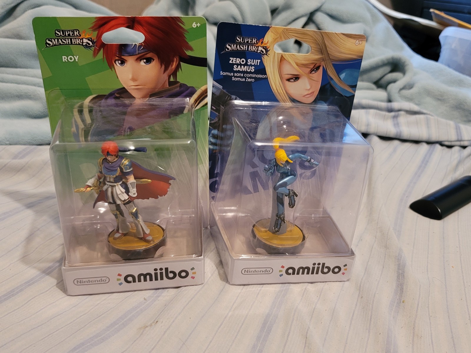 Super Smash Bros amiibos Roy and zero suit Samus new sealed