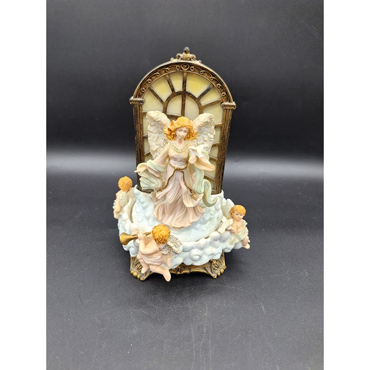 AVON LIGHTED MUSIC CAROUSEL OF CHERUBS ROTATE AROUND ANGEL HARK THE HERALD...