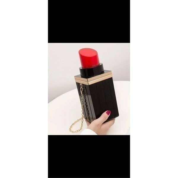 Unique lipstick pocketbook with chain. poly material durable .
