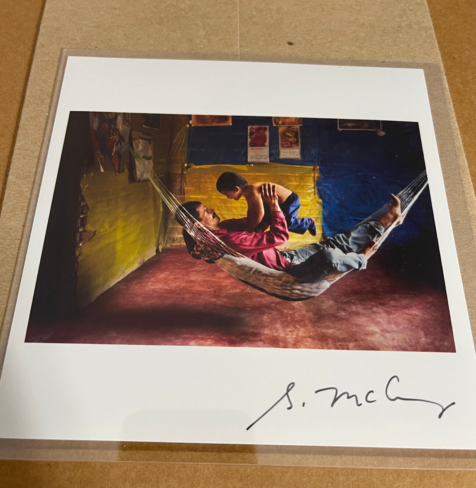 SIGNED Steve McCurry Print - Father & Son in hammock. Photo Magnum 6 x 6 MINT