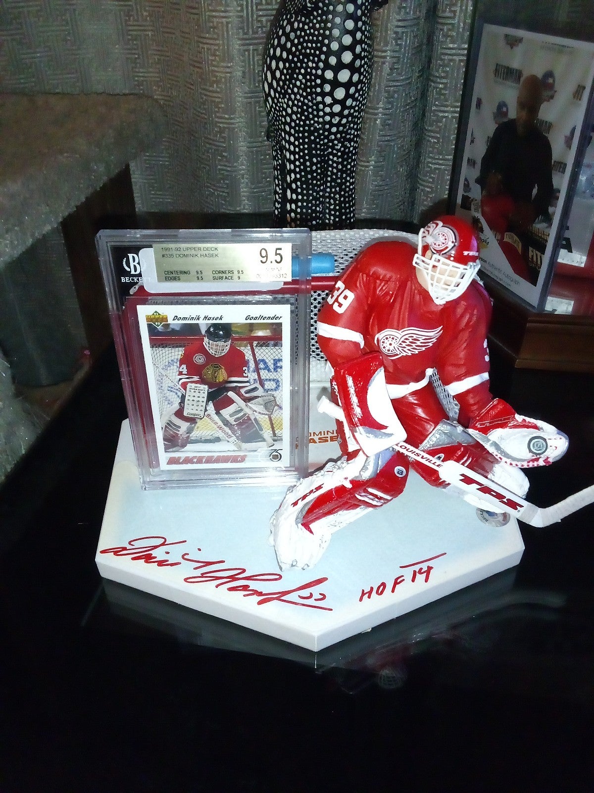 Dominik Hasek signed McFarland action figure with 9.5 GEM MINT ROOKIE CARD