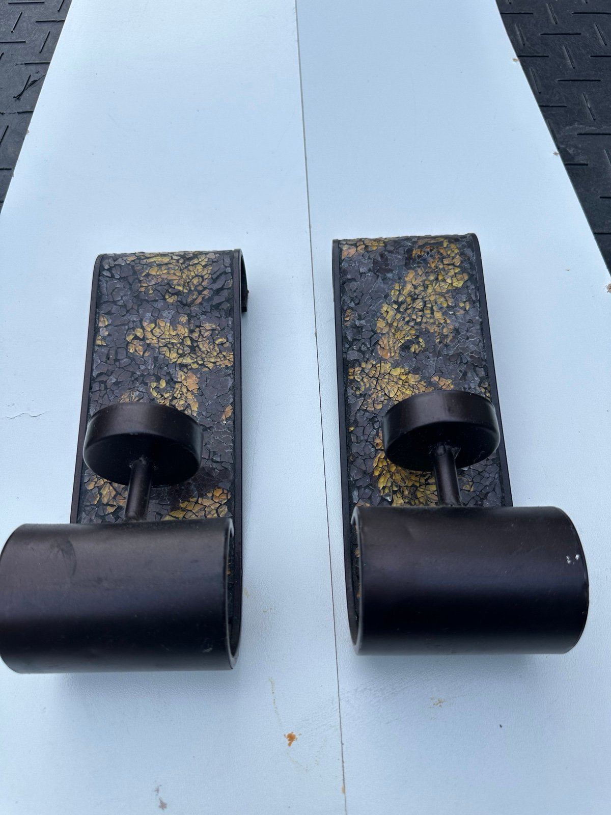 Two matching Gold and black candle holders and two matching black metal Wire pho