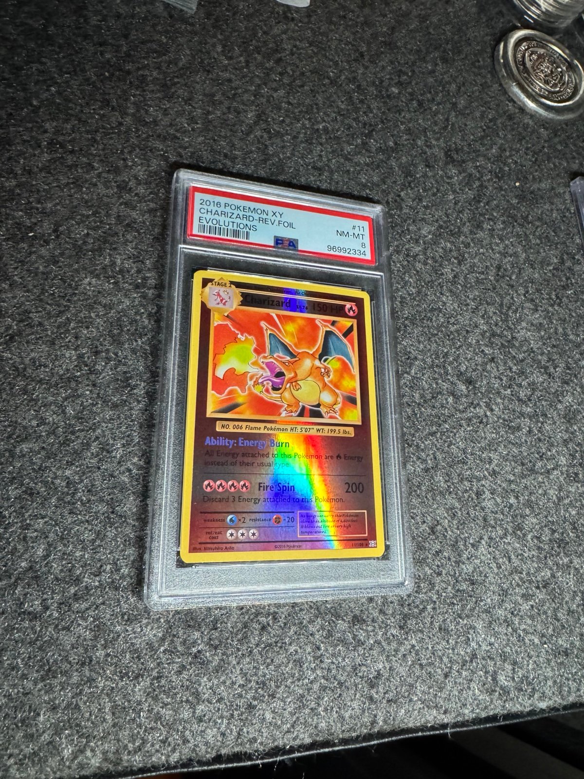 Reverse holo zard from evolutions psa8