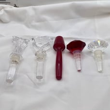 Towle Crystal Wine Stoppers and 2 signed Oleg Cassini one red unsigned lot of 5