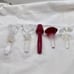 Towle Crystal Wine Stoppers and 2 signed Oleg Cassini one red unsigned lot of 5