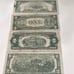 4 bills one dollar bill and two dollar bill and one five dollar bill