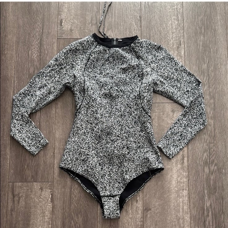 Lululemon black and white rash guard one piece swimsuit. Size 6
