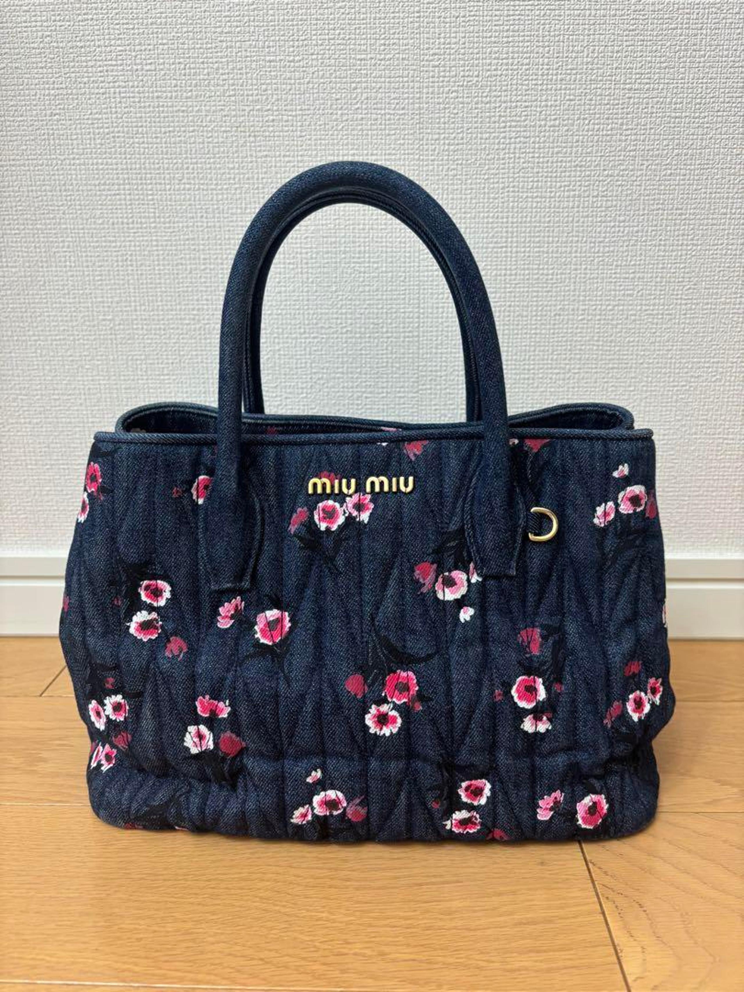 Miu Miu floral matelassé denim bag
