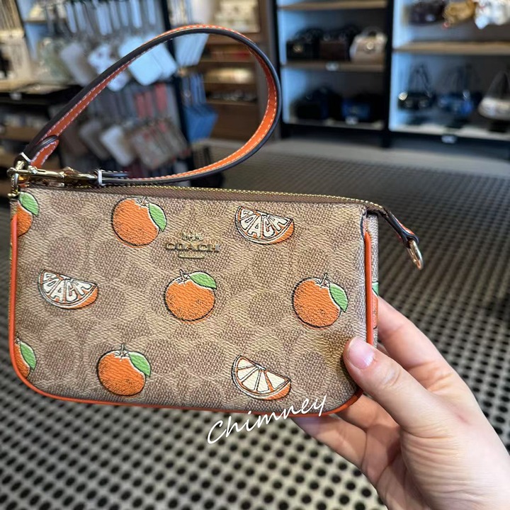 NWT Coach Nolita 19 In Signature Canvas With Orange Print