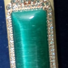 Vintage pendant: green eye: q379B