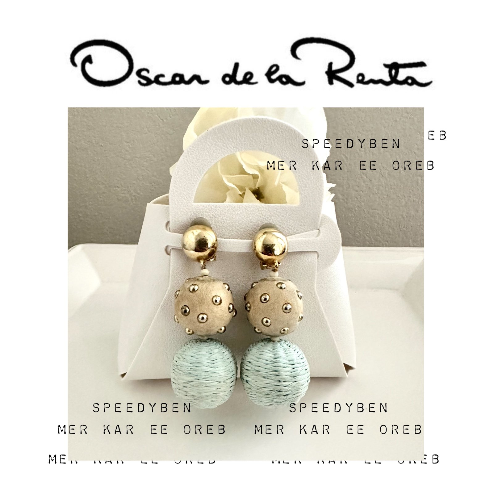 Oscar de la Renta Aquamarine Raffia Ball Cip-on Earrings