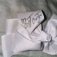 JOJO SIWA + JESSALYN SIWA AUTOGRAPH BOW
